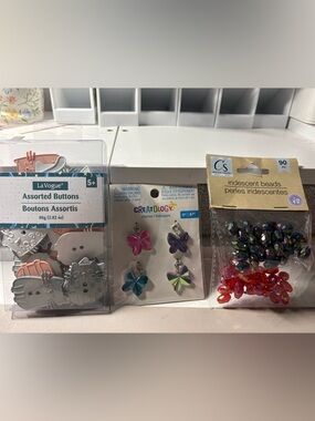 Cat Buttons, charms and irredescent beads.